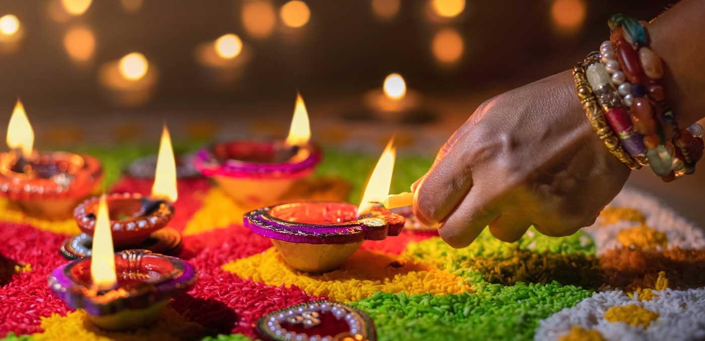 Traditional diya lamps lit during diwali celebration