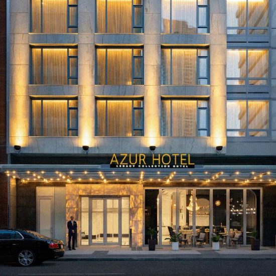 Exterior night shot of Azur Legacy Hotel