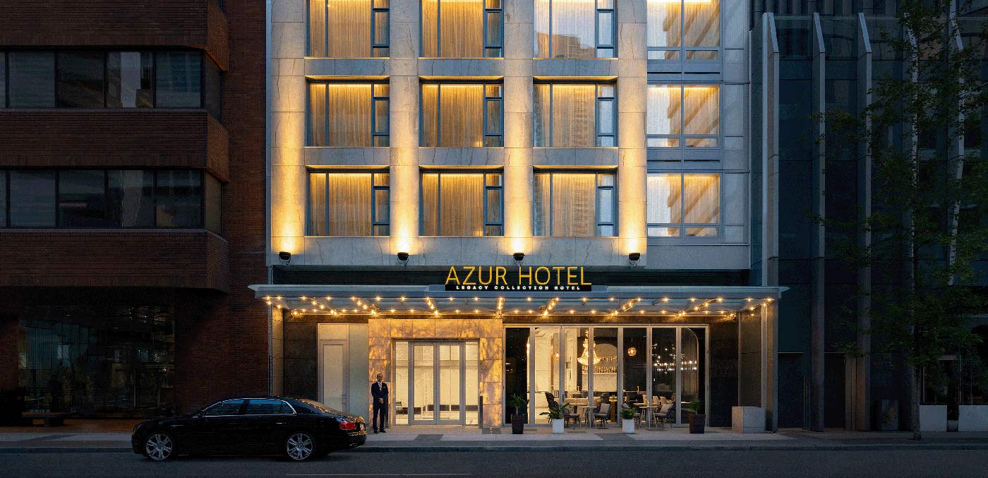 Exterior night shot of Azur Legacy Hotel