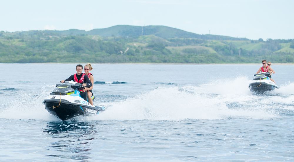 Two couples jetskiing