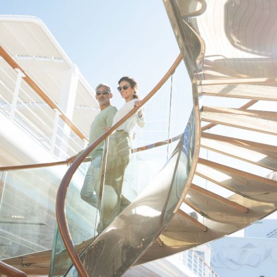 Seven Seas Grandeur stairs on upper deck cruising Europe in style