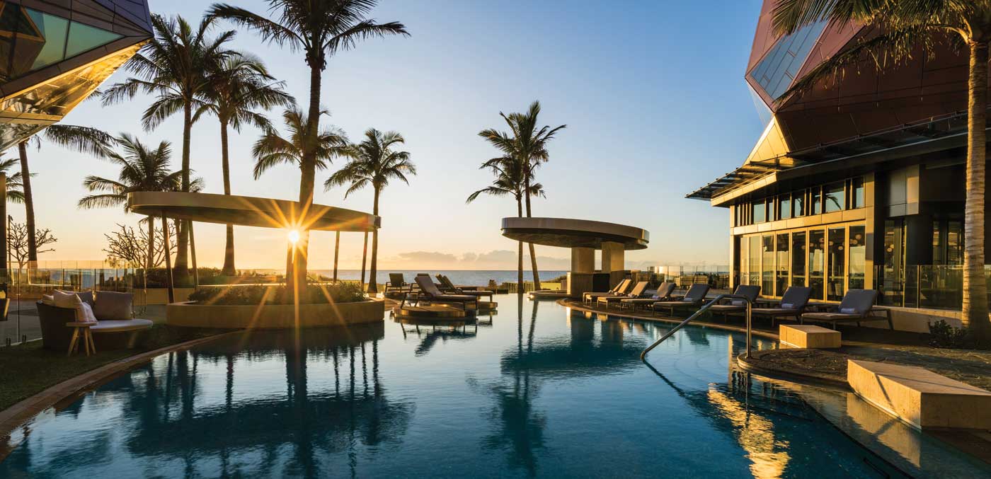 Lagoon pool with a swim up bar at The Langham, Gold Coast