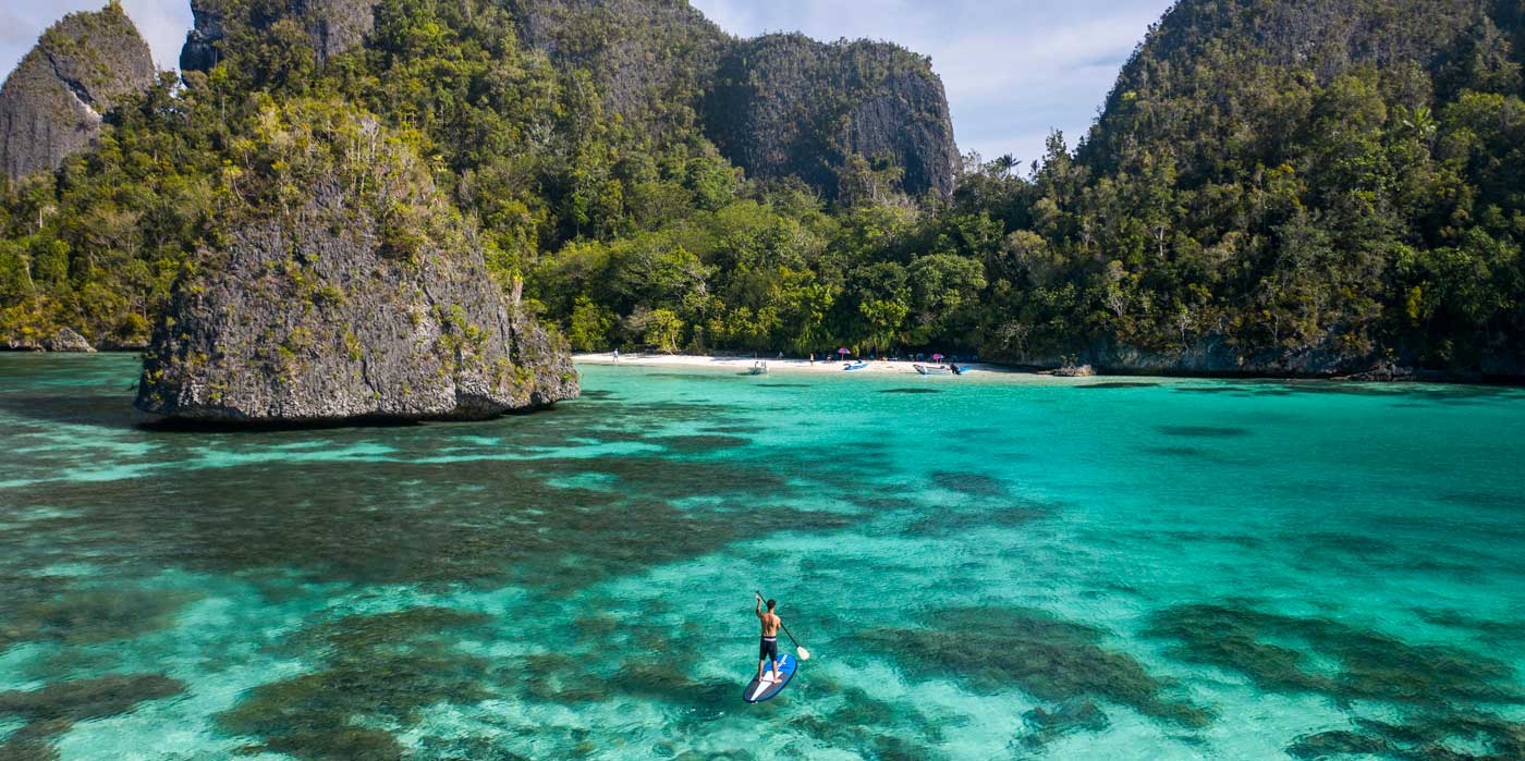 Stand up paddleboarding in Raja Ampat with True North